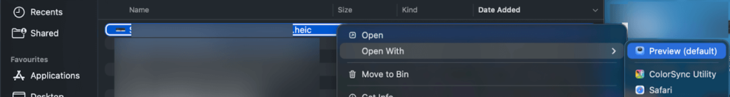 Right-click on selected HEIC images and open them with Preview on Mac